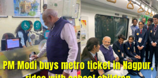 PM Modi buys metro ticket in Nagpur, rides with school children.